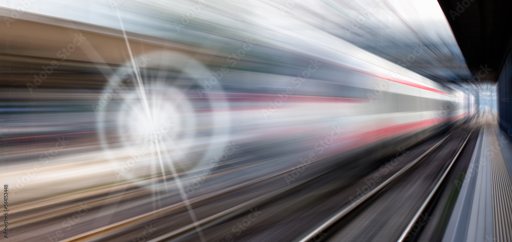 Wall mural High speed train runs on rail tracks - The train is going too fast as a result the air pressure is causing too much heat at the front