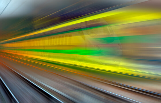 High speed train runs on rail tracks - Train in motion