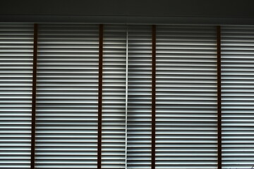 white blinds curtain put on the window, interior design