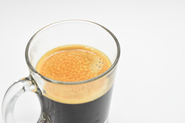 hot black coffee put on white table background
