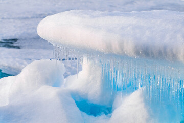 Icicles melting from an ice floe © Lars Johansson