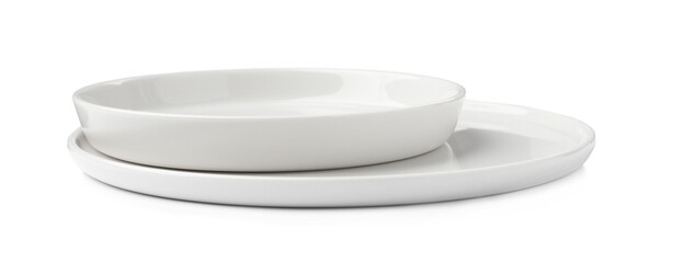 Beautiful empty ceramic plates on white background