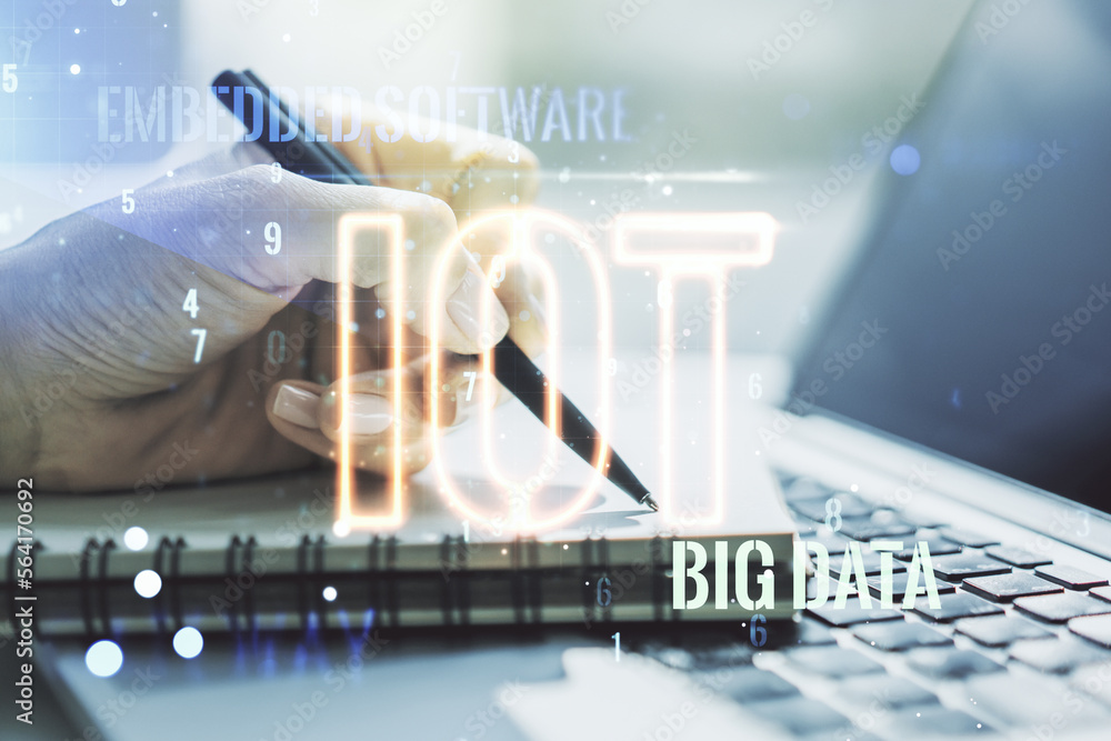 Poster Creative IOT concept with hand writing in notebook on background with laptop. Multiexposure