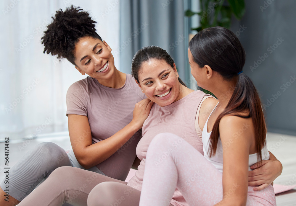 Wall mural Friends, hug and yoga on a floor, bonding and relax, exercise and meditation, happy and smile while embracing. Women, group and embrace in living room, positive and caring while talking after pilates