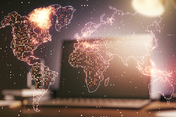 Abstract creative world map on modern laptop background, international trading concept. Multiexposure