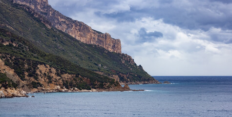 Rocky Coast by the Sea. Sardinia, Italy. Nature Background.