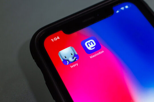 Vancouver, CANADA - Jan 23 2023 : Ivory, third party app that integrates with the Mastodon social network by Tapbots, and Mastodon icons in an iPhone. New service for Mastodon and Twitter user concept