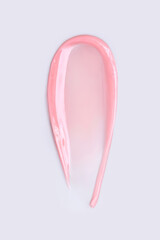 cosmetic smear of balm mask gel on light gray background