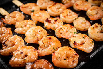 Delicious grilled shrimp. Macro background.