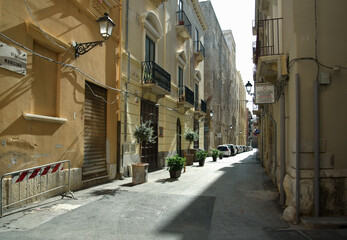 Obraz premium Narrow street in Trapani.