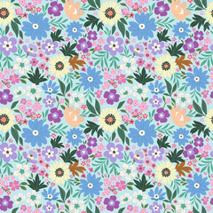 Floral pattern of blue, light yellow and purple flowers on a light turquoise background in cool tones. Rustic chic.