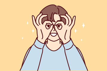 Young woman puts hands to face imitating invisible binoculars to look at object in distance. Funny girl looks at display using fingers instead of carnival mask. Flat vector illustration