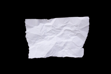 Obraz premium Blank torn paper isolated on black background. Top view of white paper piece with copy space.