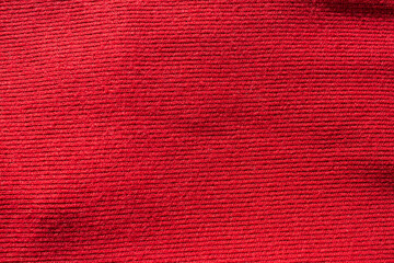 Abstract red fabric texture background.