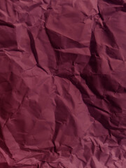 Abstract wrinkled or Free photo crumpled brown or red paperboard or empty canvas or paper surface with folded stains.