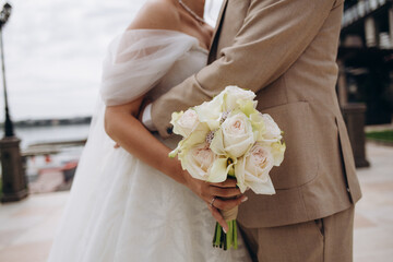 Wedding bouquet of the bride. Wedding day. Happy bride. The bride's bouquet. Beautiful bouquet of white flowers. Beautiful flowers