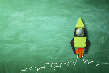 Front view on blank green chalkboard background with place for advertising logo or poster and taking off bright graphic rocket, startup concept. 3D rendering, mock up