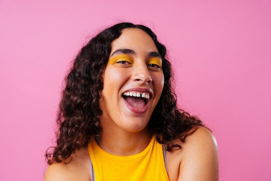 Creative studio portrait of beautiful hispanic woman with diastema - Cool, modern and unique female adult posing on colorful background, concepts about diversity, individuality and fashion