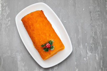 Typical portuguese orange cake on white dish