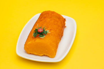 Typical portuguese orange cake on white dish