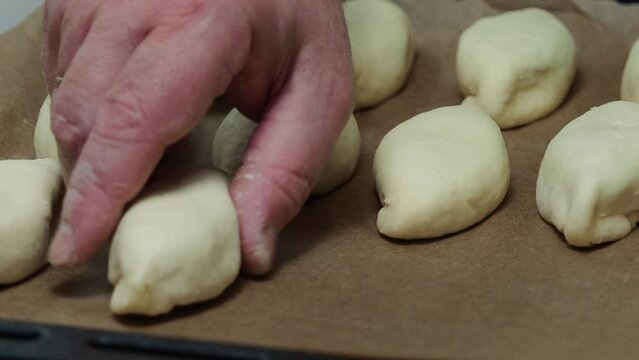 Pies on a baking tray. The concept of baking at home. 