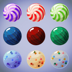 Set of nine objects for interface design. Bright multi-colored lollipops and candies. Templates for mobile games. Cute cartoon sweets.
