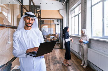 Middle-eastern group of corporate businesspeople working in a business office - Arab businessman...