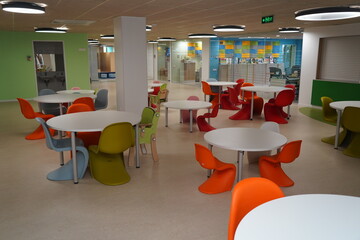 Almaty, Kazakhstan - 10.12.2022 : Tables for classes and lunches in the kindergarten room