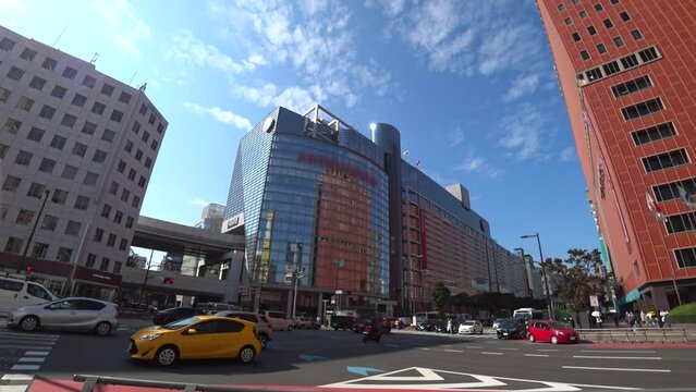 FUKUOKA, JAPAN - NOVEMBER 2022 : View around TENJIN area in Fukuoka city. Nishitetsu Fukuoka, Tenjin station and department stores. Busy downtown shopping area.