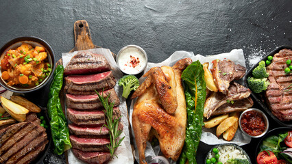 Various food. Meat dishes and vegetable dishes. Menu. Food on the plates.