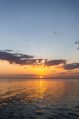 Fototapeta na wymiar Sunrise over the water