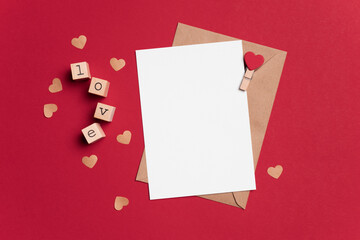 Valentines Day greeting card mockup on red background, flat lay with copy space