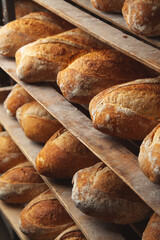 Soft bread is on the bakery shelf.  Transportation of pastries. Bread baking