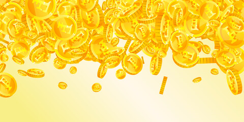 Obraz premium Swiss franc coins falling. Gold scattered CHF