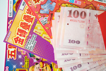 Taipei, Taiwan - 21 Jan 2023: Closeup of Red envelope packetp,Taiwanese currency and Taiwan...