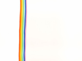 Rainbow cloth ribbon on a white background