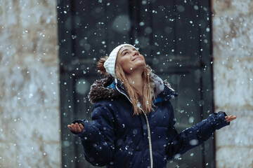 Young Woman on Joyful Winter Day - 564236616