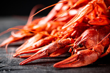 A bunch of boiled crayfish on the table. 