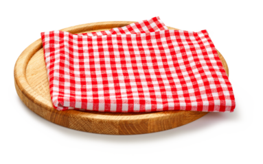 Red check napkin and board for pizza on white background. Red napkin on wooden round board isolated.