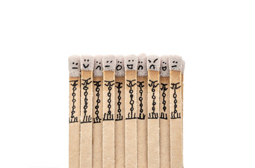 matchsticks with faces painted on the heads
