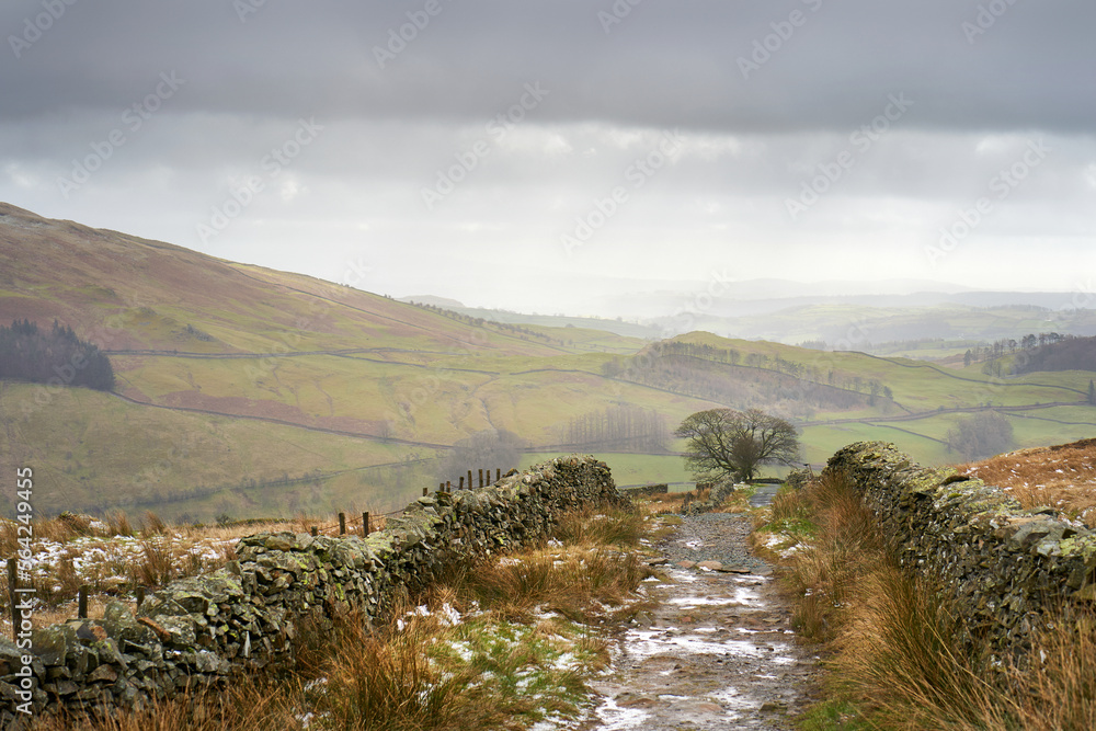 Sticker views towards troutbeck from the dirt track of nanny lane on a cold winters morning in the lake dist