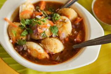 Many Idli or small button idly breakfast of Kerala Tamil Nadu South India and Sri Lanka. Healthy steamed rice cakes by steaming fermented batter of black lentils and rice coconut chutney.