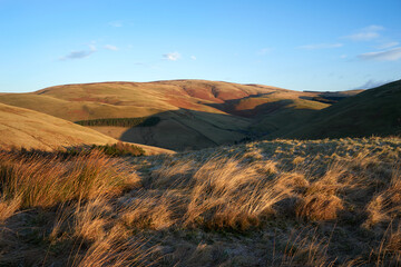 The summit of Windy Gyle on a sunny winters morning in the Northumberland Cheviot mountains at...