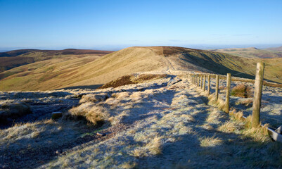 Views of Mozie Law from Windy Gyle on a sunny but frosty winters morning in the Northumberland Cheviot mountains at sunrise, UK.