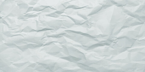 Crumpled white creased paper sheet texture can be use as background. Ragged White Paper,white waxed packing paper texture.	