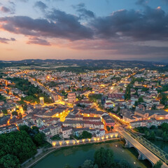 Fototapeta premium Old italian city Umbertide near Tevere river with cloudy sunset light. Aerial view from above