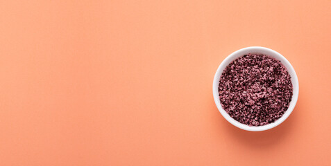 Hibiscus salt crystals in the wooden bowl - Seasoning for flavoring and seasoning food