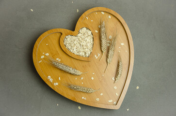 vegetable milk from flakes in a glass on a wooden tray. Vegetarian dietary food