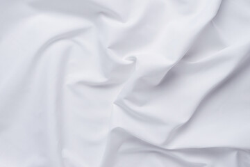 Fototapeta premium White fabric. luxurious white fabric texture background. Creases of satin, silk and cotton. 