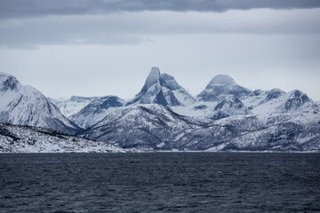 Amazing mountains in Norway. Lofoten with sunset colors and ocean, sea